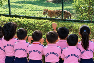 Schoolchildren Watching a Tiger